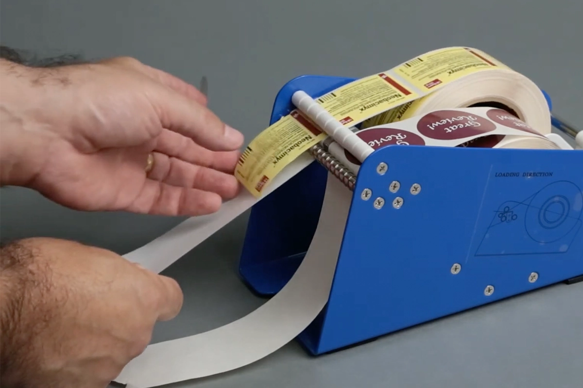 Why Label Dispensers Save Time & Money – Packaging Tools